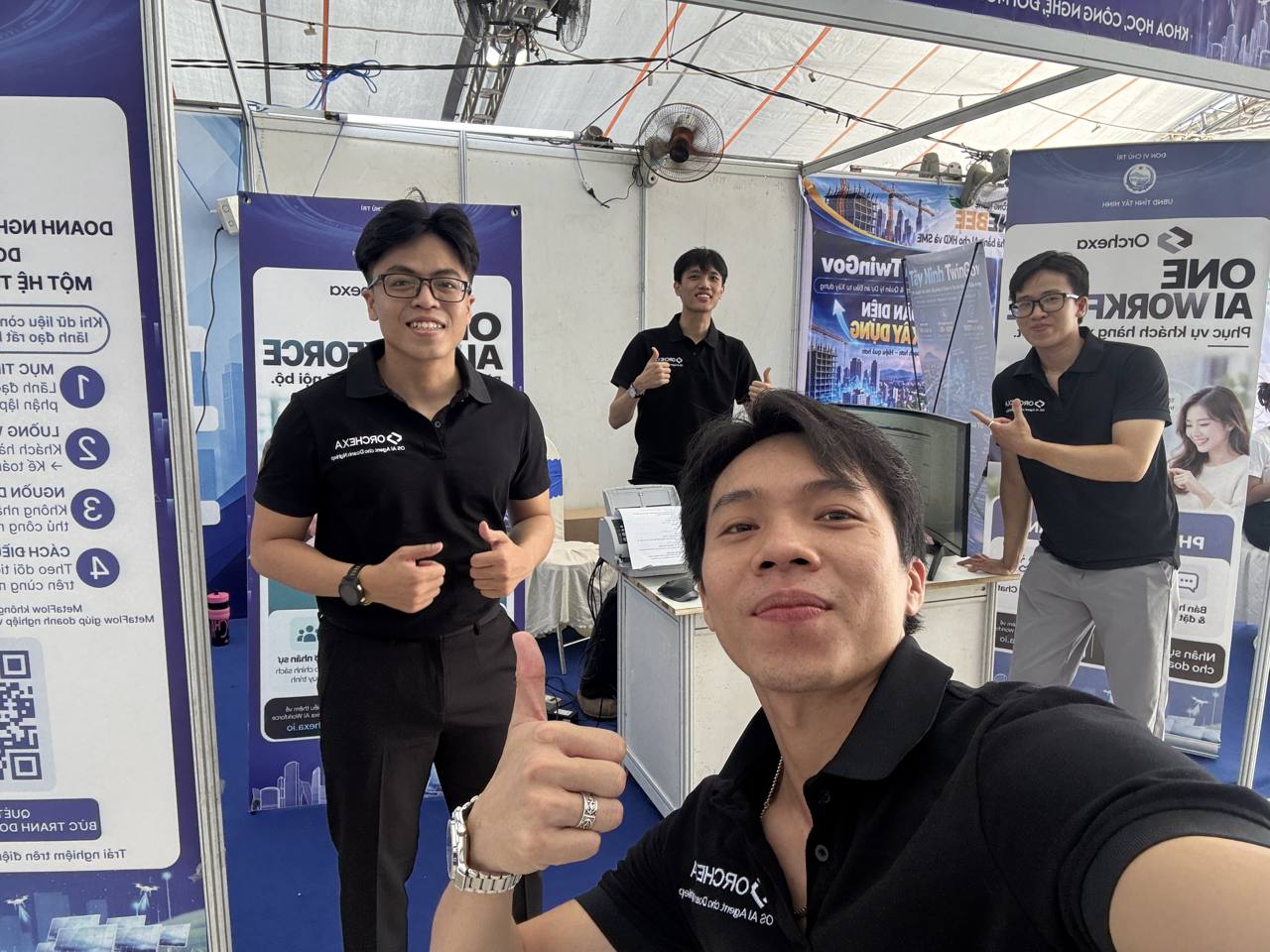 Orchexa team selfie at the booth